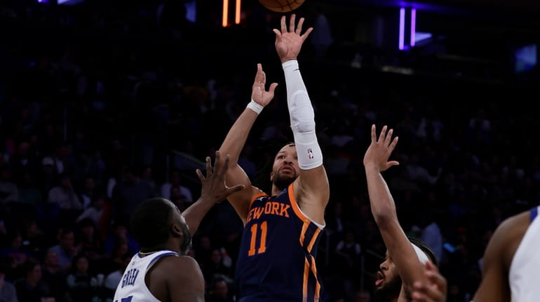Jalen Brunson #11 of the Knicks puts up a shot during...