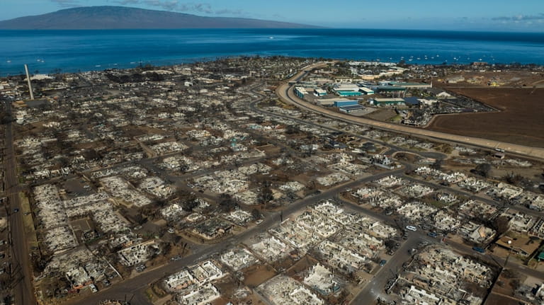 The aftermath of a wildfire is visible in Lahaina, Hawaii,...