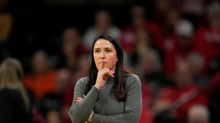 Nebraska head coach Amy Williams watches from the bench during...