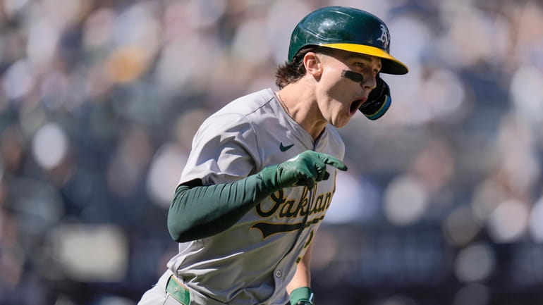 Oakland Athletics' Zack Gelof reacts after hitting a two-run home...