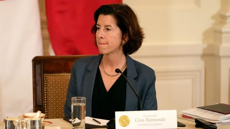 Commerce Secretary Gina Raimondo attends a trilateral meeting with President...