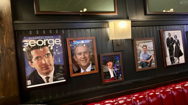 A collection of George-themed artwork at The George in Rockville...