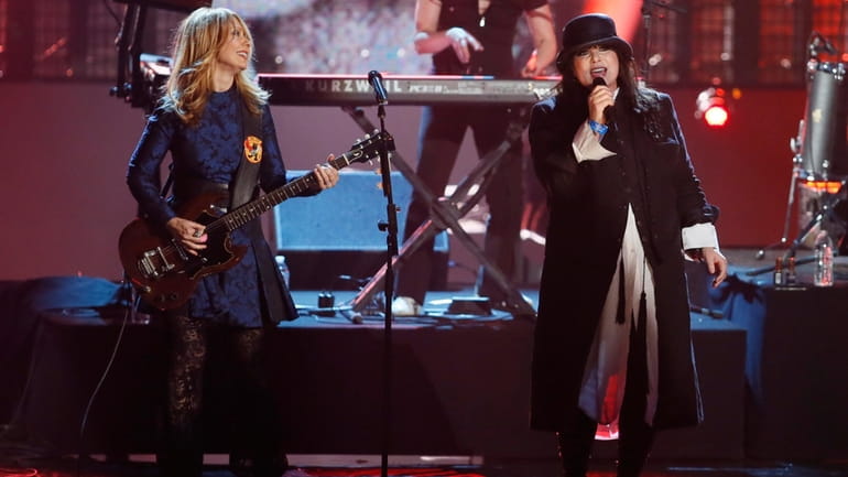 Nancy Wilson, left, and Ann Wilson, right, of the band...