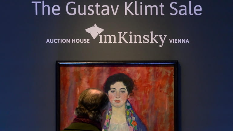 A man looks at the painting 'Portrait of Fräulein Lieser'...