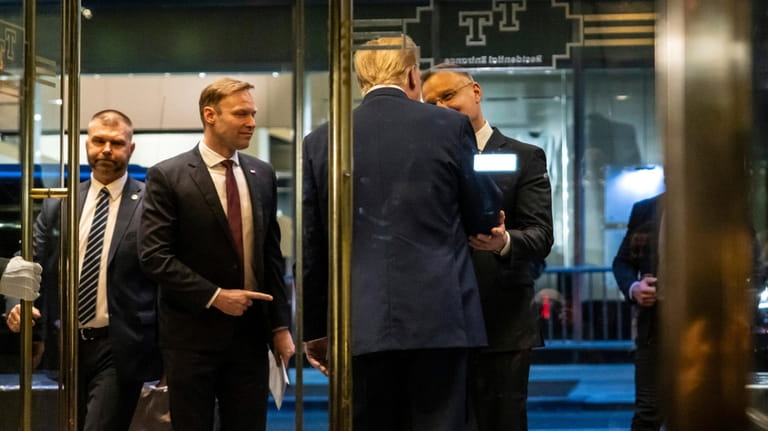 Republican presidential candidate former President Donald Trump greets Poland's President...