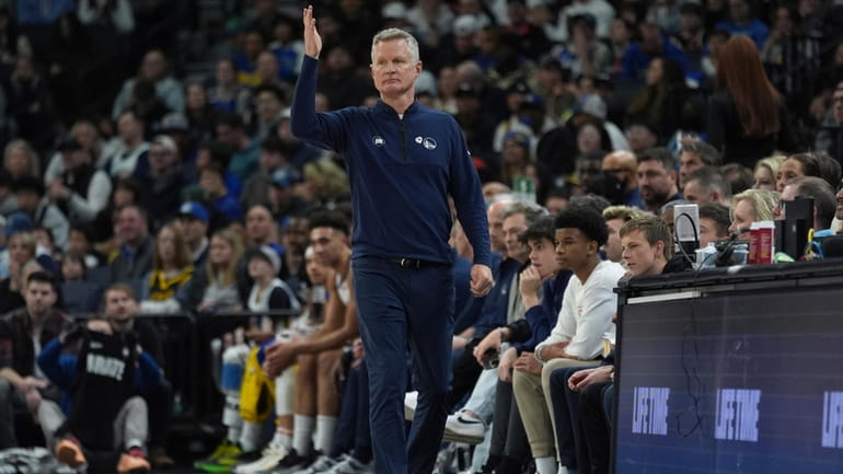 Golden State Warriors head coach Steve Kerr gestures during the...