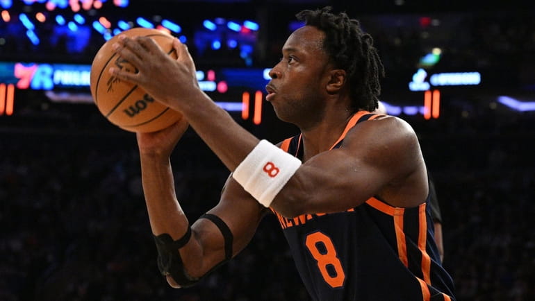 Knicks forward OG Anunoby lines up his shot for a...