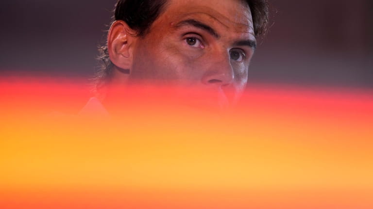 Spanish tennis player Rafael Nadal gives a press conference at...