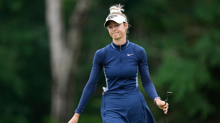 Nelly Korda reacts to a missed putt on the seventh...
