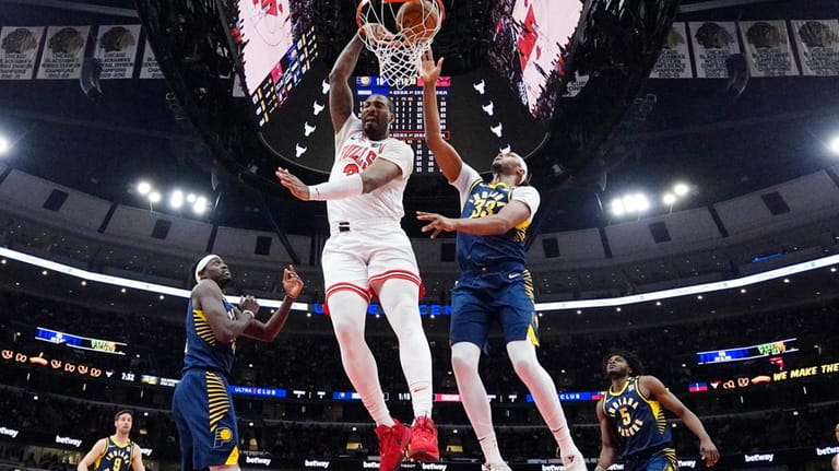 Chicago Bulls center Andre Drummond (3) dunks against Indiana Pacers...