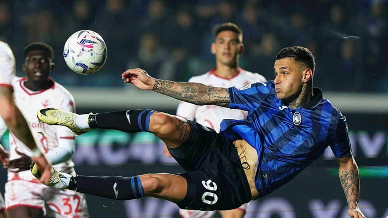 Atalanta's Gianluca Scamacca scores during the Coppa Italia soccer match...