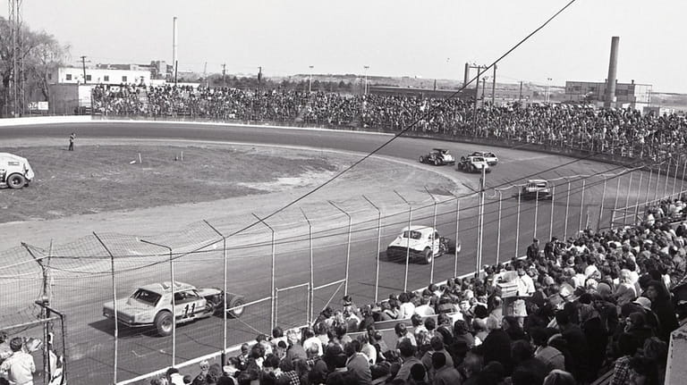 Spectators fill the stands at Freeport Speedway on April 21,...