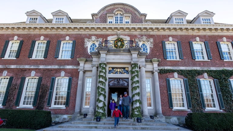 Visitors tour Westbury House at Old Westbury Gardens, November 2022.