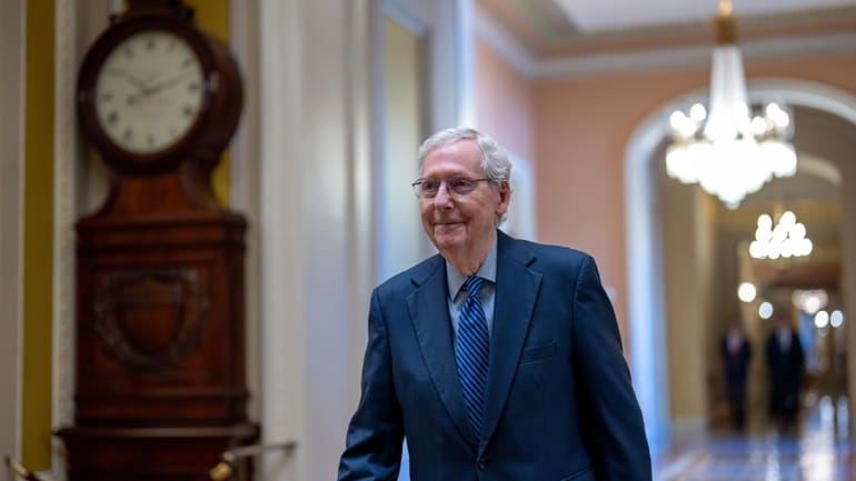 Senate Minority Leader Mitch McConnell, R-Ky., walks to the chamber...