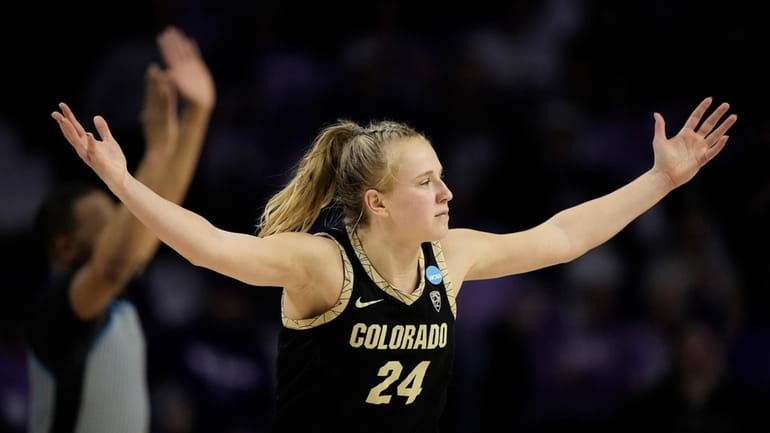 Colorado guard Maddie Nolan celebrates after making a basket during...
