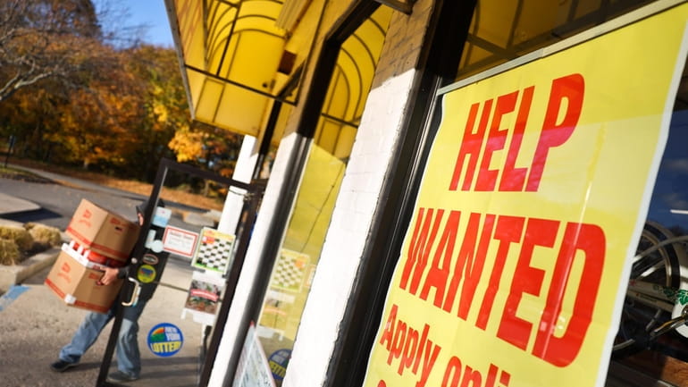 A help wanted sign in Mattituck, Tuesday, Nov. 23, 2021.