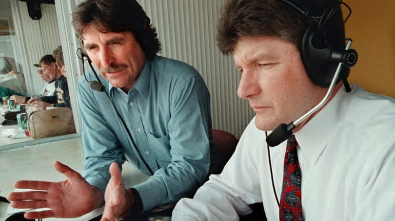 University of Iowa football radio color commentator Ed Podolak, left,...