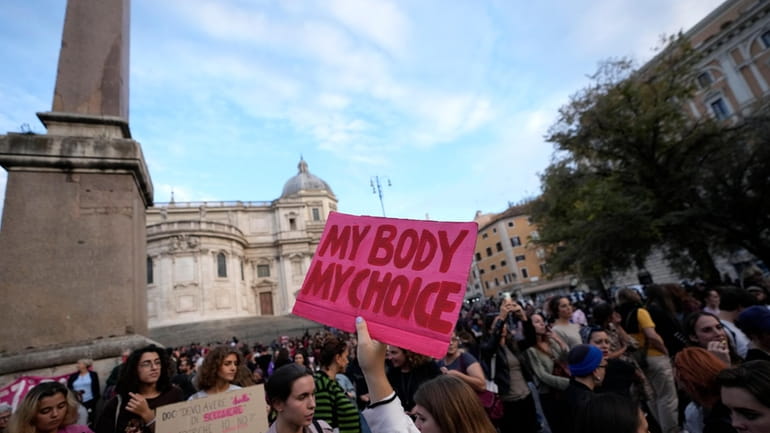 People stage a protest on 'International Safe Abortion Day' to...
