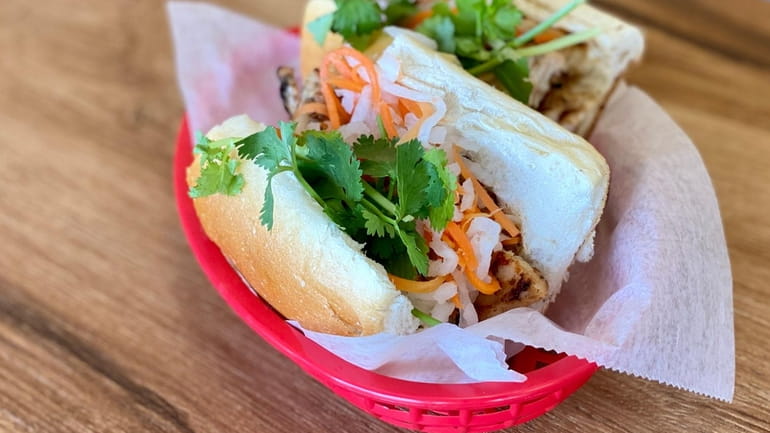A grilled barbecue chicken banh mi at the Rolling Spring Roll...