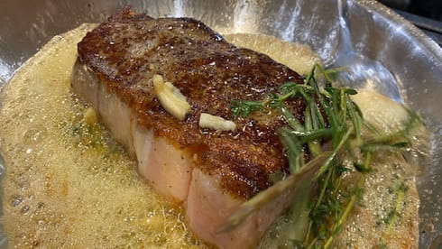 Students learn how to cook a steak like a chef...