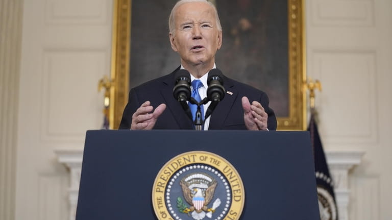 President Joe Biden speaks about a $95 billion aid package...