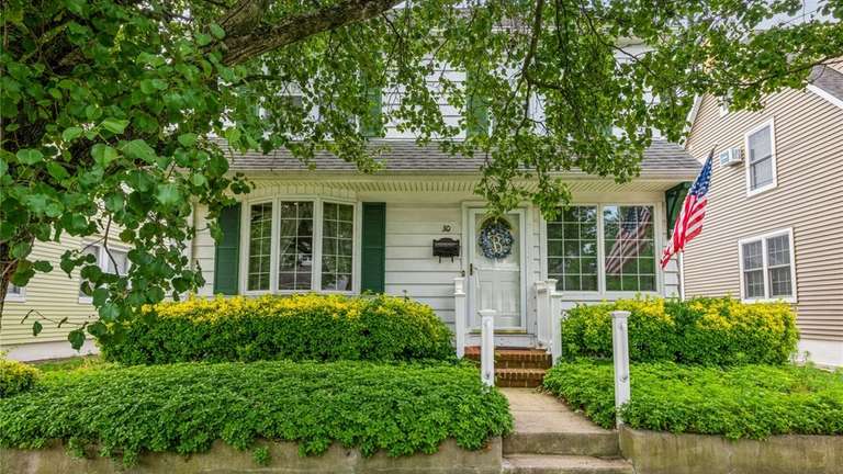 Priced at $620,000, this Colonial building on Cornell Street has...