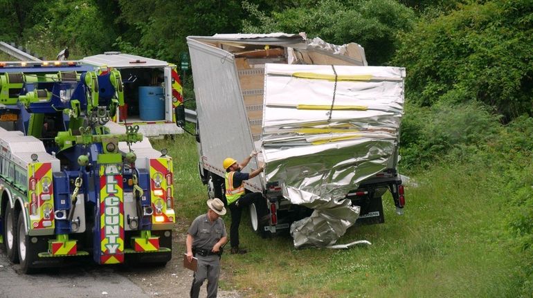 The truck that officials said hit Eagle Avenue overpass on...