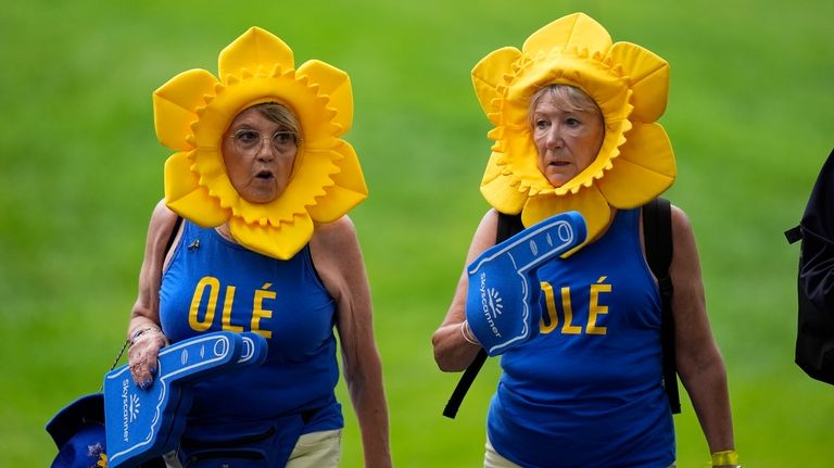 Fans are seen during a Solheim Cup golf tournament foursomes...