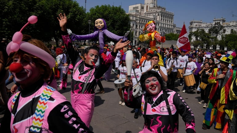 Clowns gather in the San Martin plaza to celebrate The...