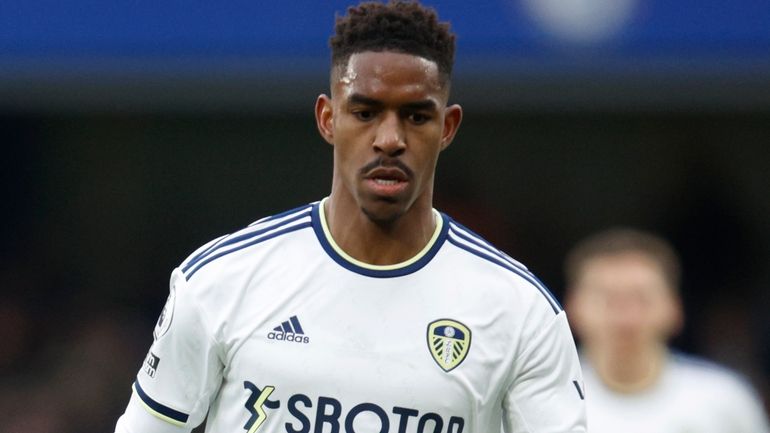 Leeds United's Junior Firpo vies for the ball with Chelsea's...