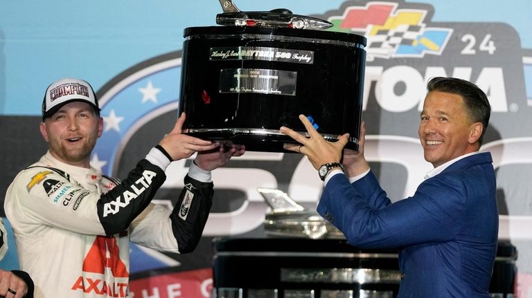 William Byron, left, winner of the NASCAR Daytona 500 auto...