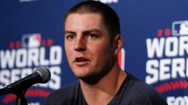 Cleveland Indians' Trevor Bauer talks during a news conference before...