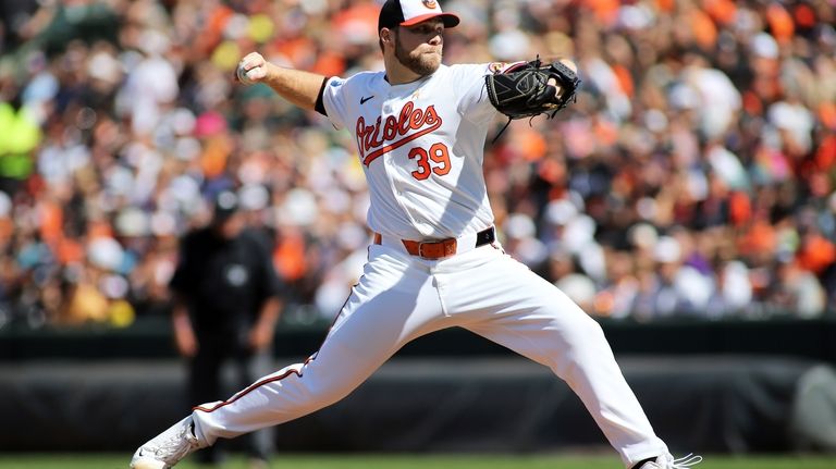 Baltimore Orioles pitcher Corbin Burnes delivers during the first inning...