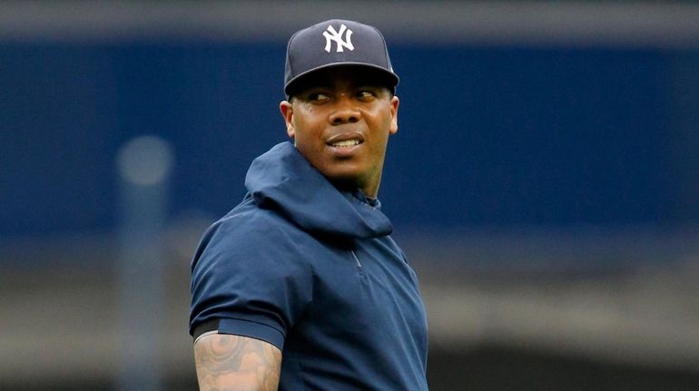 Aroldis Chapman of the Yankees throws on the field prior to...