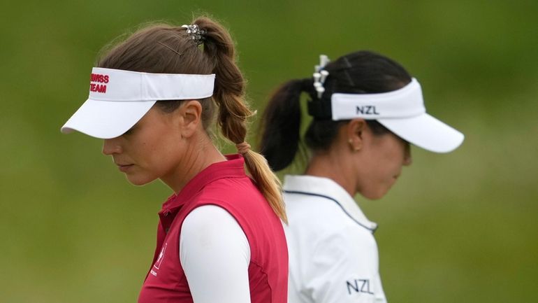 Morgane Metraux, of Switzerland,, left and Lydia Ko, of New...