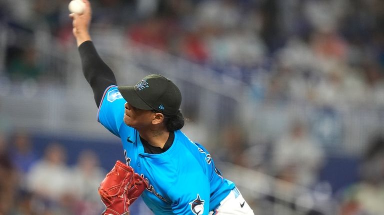 Miami Marlins starting pitcher Edward Cabrera throws during the fifth...