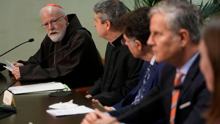 Boston Cardinal Seán Patrick O'Malley, left, head of the Pontifical...