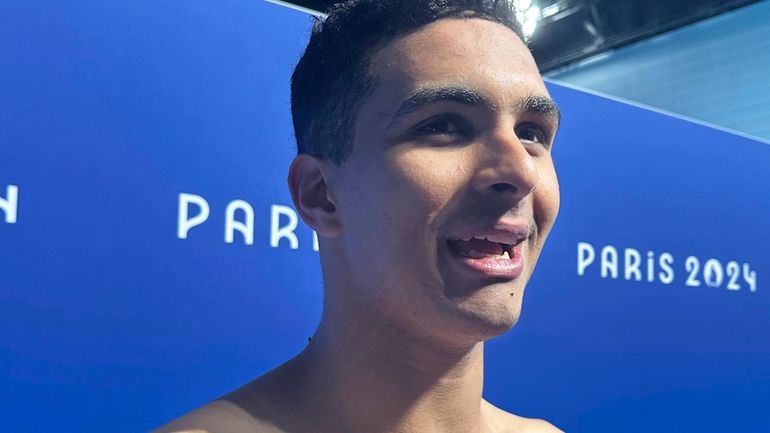 Palestinian swimmer Yazan Al Bawwab is interviewed at Paris La...