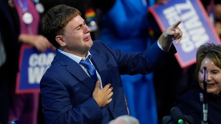 Gus Walz cries as his father Democratic vice presidential nominee...