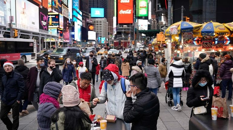 People went out to enjoy the sights around Times Square...