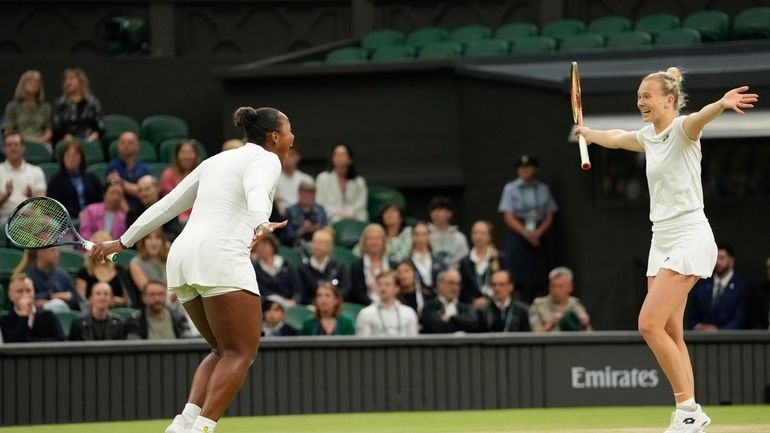 Taylor Townsend, left, of the United States and Katerina Siniakova...