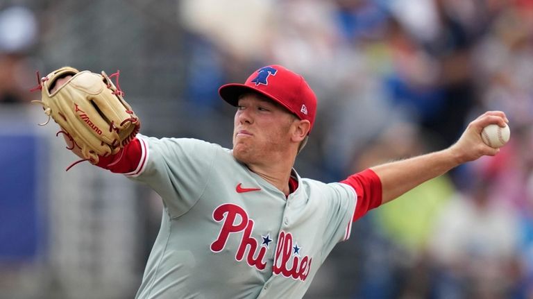 Philadelphia Phillies pitcher Kolby Allard throws in the fourth inning...