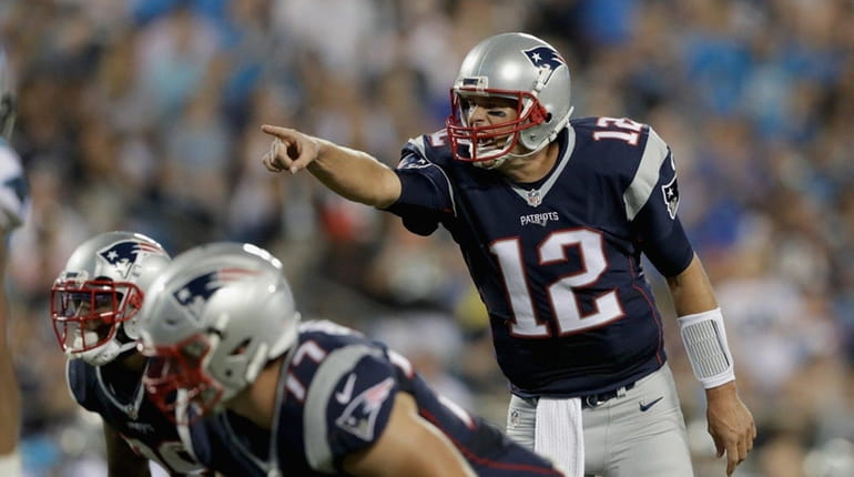 Tom Brady of the New England Patriots makes a call...