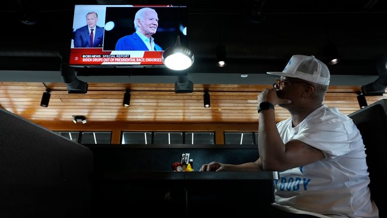 George Ledbetter watches news of President Joe Biden dropping out...