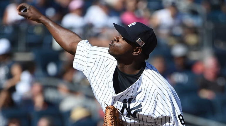 New York Yankees starting pitcher Luis Severino delivers a pitch...
