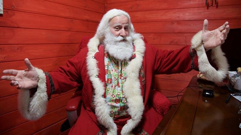 Santa Claus at his home in Copiague, Dec. 24, 2015....