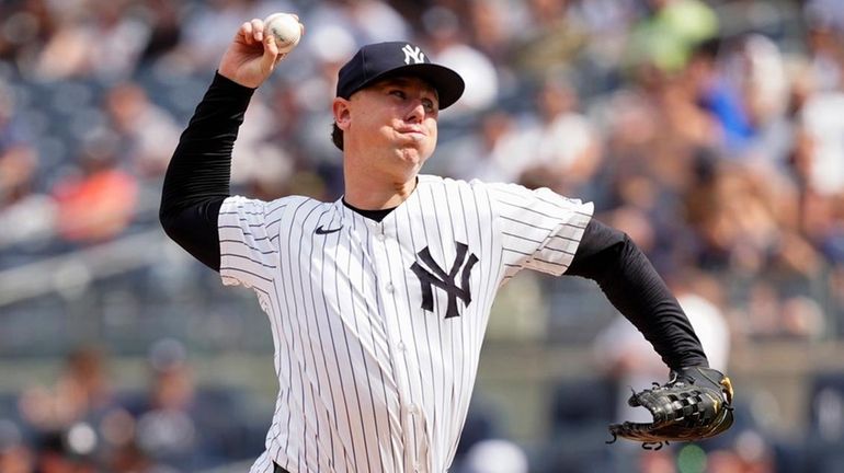 Yankees pitcher Mark Leiter Jr. delivers a pitch during the ninth...