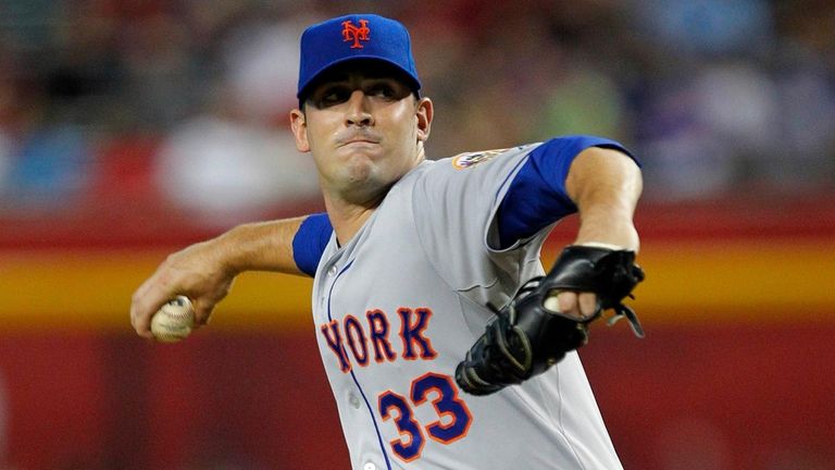 The Mets' Matt Harvey pitches in the first inning of his...