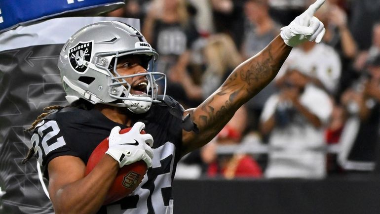 Las Vegas Raiders wide receiver Tyreik McAllister (32) celebrates after...