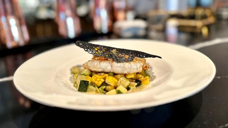 Montauk fluke with summer squash and a squid-ink tuile at...